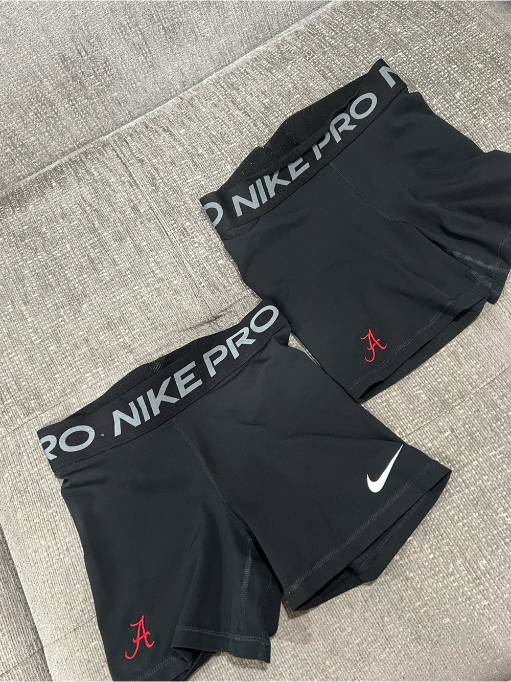 2 pair of official Alabama Nike Pro Women's 3" Training Compression Shorts